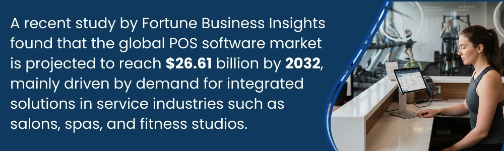 Fitness studio receptionist using a tablet POS at front desk