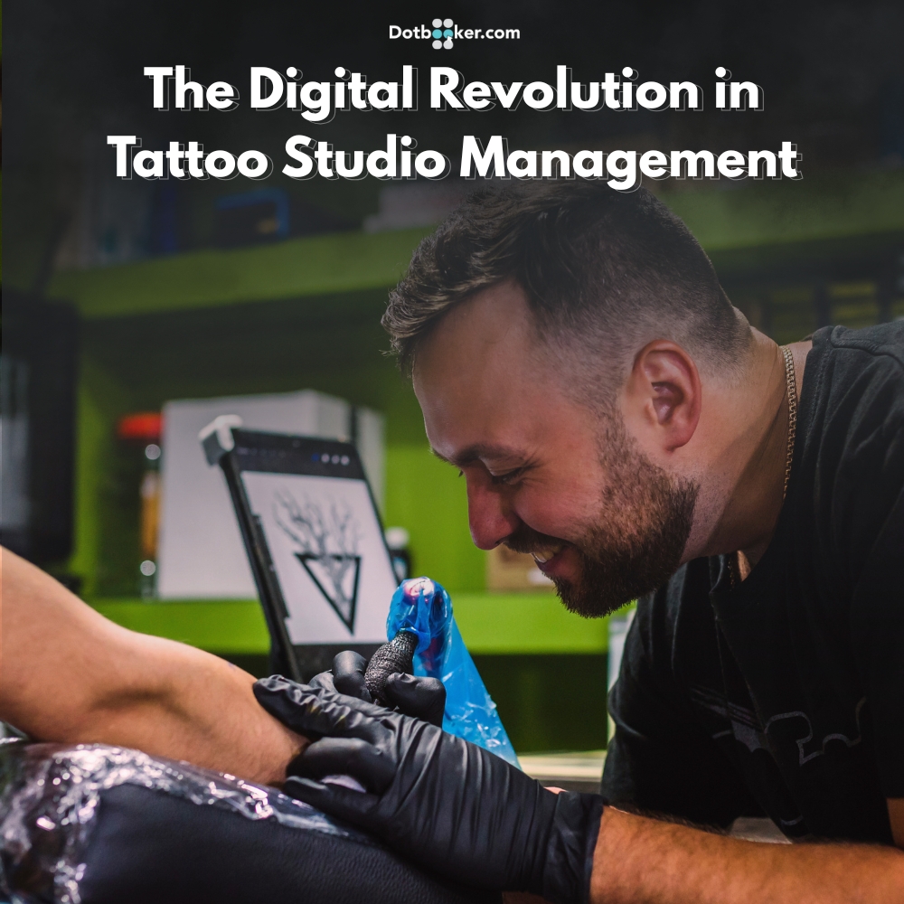 Tattoo artist managing appointments with digital software in modern studio