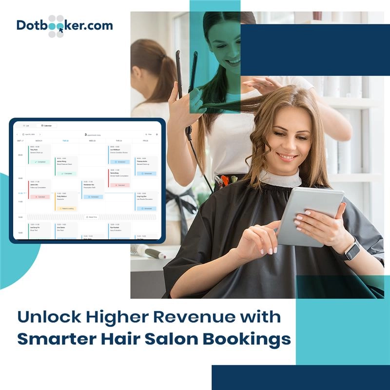 Hair stylist managing appointments on smart booking software in a modern salon